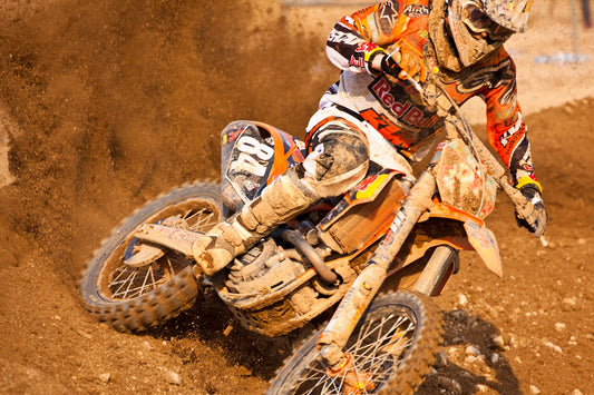 man riding motocross dirt bike