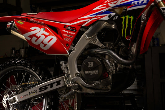 red and black honda motorcycle